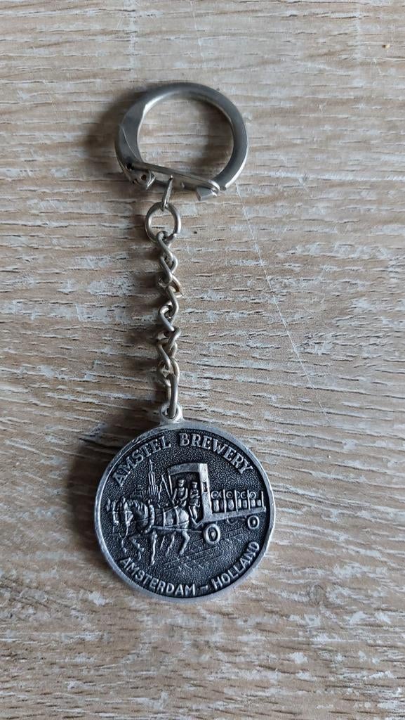 Sleutelhanger bier merk Amstel brewery Amsterdam Holland, Ophalen of Verzenden, Zo goed als nieuw, Merk