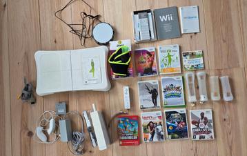Wii met 8 spelletjes / balance board beschikbaar voor biedingen