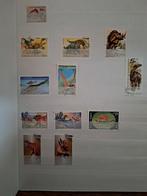 Dinosaurus postzegels in map, Postzegels en Munten, Overige thema's, Ophalen