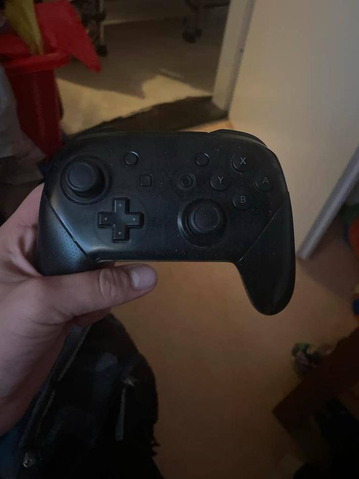 Nintendo Switch Pro Controller - Zwart, Spelcomputers en Games, Spelcomputers | Overige, Gebruikt, Ophalen