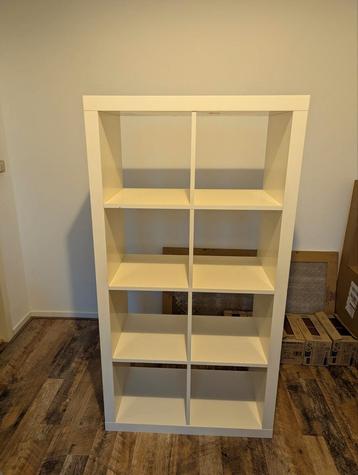 Kallax kast wit, 8 vakken, met deurtjes en lades