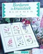 Boek Bloemen borduren in kruissteek, Hobby en Vrije tijd, Borduren en Borduurmachines, Verzenden, Zo goed als nieuw, Handborduren