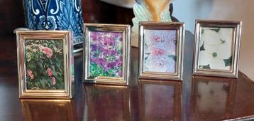 Set van 4 zilverkleurige fotolijstjes beschikbaar voor biedingen