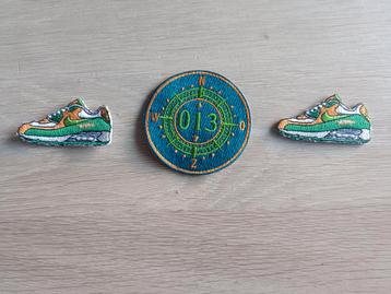 Carnavals Emblemen: Nike & Kompas beschikbaar voor biedingen