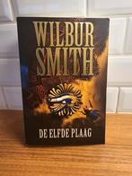 Wilbur Smith - De elfde plaag, Boeken, Wilbur Smith, Ophalen of Verzenden, Zo goed als nieuw