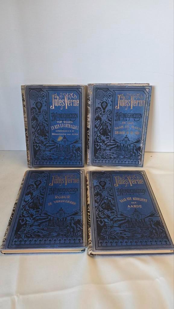 Jules Verne Wonderreizen – 4-delige Elsevier set (1928–36), Antiek en Kunst, Antiek | Boeken en Bijbels, Ophalen of Verzenden