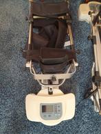 Kniebuigmachine, Ophalen