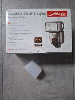 Nieuw in doos Metz Mecablitz 50 af-1 voor Canon met kapje., Ophalen of Verzenden, Nieuw, Metz