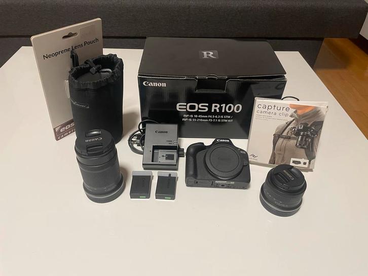 Camera Canon EOS R100 with 2 lenses, extra battery and clip, Audio, Tv en Foto, Fotocamera's Digitaal, Zo goed als nieuw, Compact