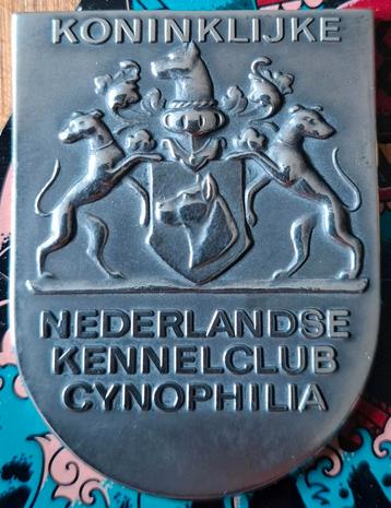 Koninklijke Nederlandse Kennelclub Cynophilia Speld beschikbaar voor biedingen