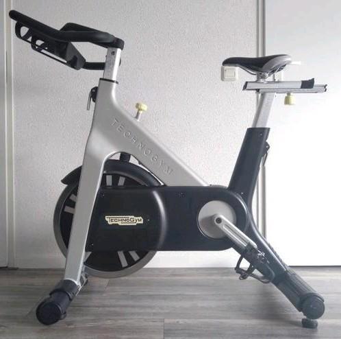 Technogym Group Cycle, Sport en Fitness, Fitnessapparatuur, Zo goed als nieuw, Spinningfiets, Armen, Benen, Borst, Buik, Rug, Metaal