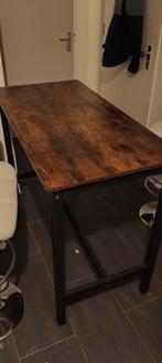 Hoge tafel met houten blad, Ophalen