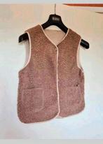 Nieuwe bodywarmer van teddy stof maat L. Okselmaat 51 cm, Kleding | Dames, Bodywarmers, Ophalen of Verzenden, Nieuw, Maat 42/44 (L)