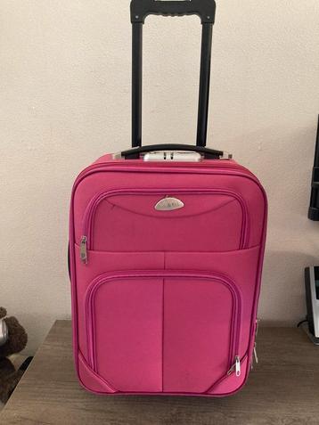 Roze koffer