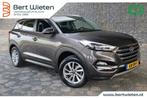 Hyundai Tucson 1.6 GDi Comfort | Geen import | Trekhaak | Na, Voorwielaandrijving, 4 cilinders, Bruin, Leder en Stof