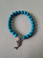 Super mooie dolfijnen armband, Overige materialen, Ophalen of Verzenden, Zo goed als nieuw, Met bedels of kralen