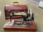 Singer naaimachine met koffer van begin 1900, Ophalen
