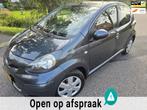 Toyota Aygo 1.0-12V Comfort Navigator/Automaat/Airco/5drs/AP, Euro 5, Stof, Gebruikt, Zwart