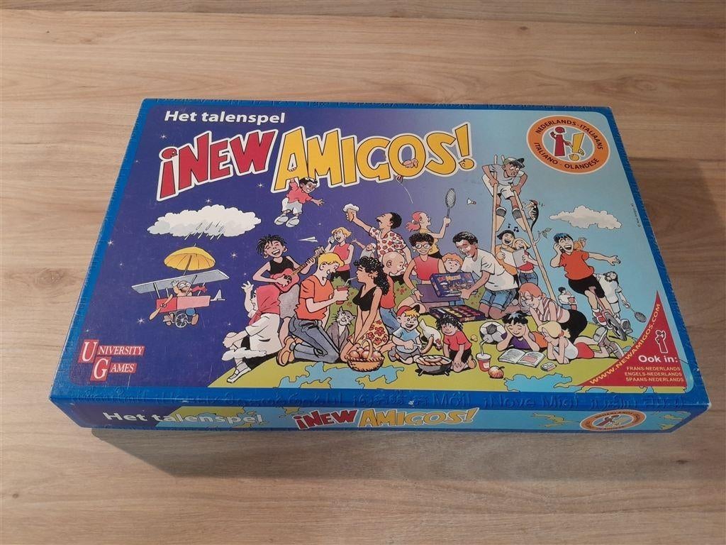 New Amigos - Het talenspel - Italiaans - Nederlands - s5885, Hobby en Vrije tijd, Gezelschapsspellen | Bordspellen, Ophalen of Verzenden