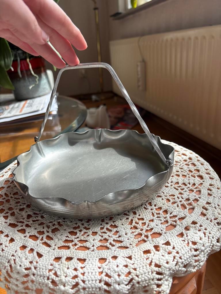 Presenteerschaal van Gero Holland, Ophalen
