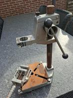 Kolomboor standaard met bankschroef, Ophalen