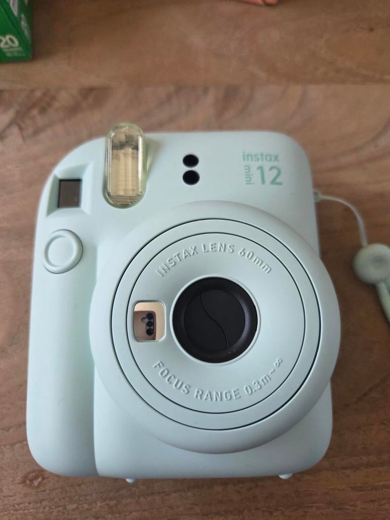 Instax Mini 12 Camera met nog 56 foto's, Audio, Tv en Foto, Fotocamera's Analoog, Ophalen of Verzenden, Nieuw, Polaroid, Fuji
