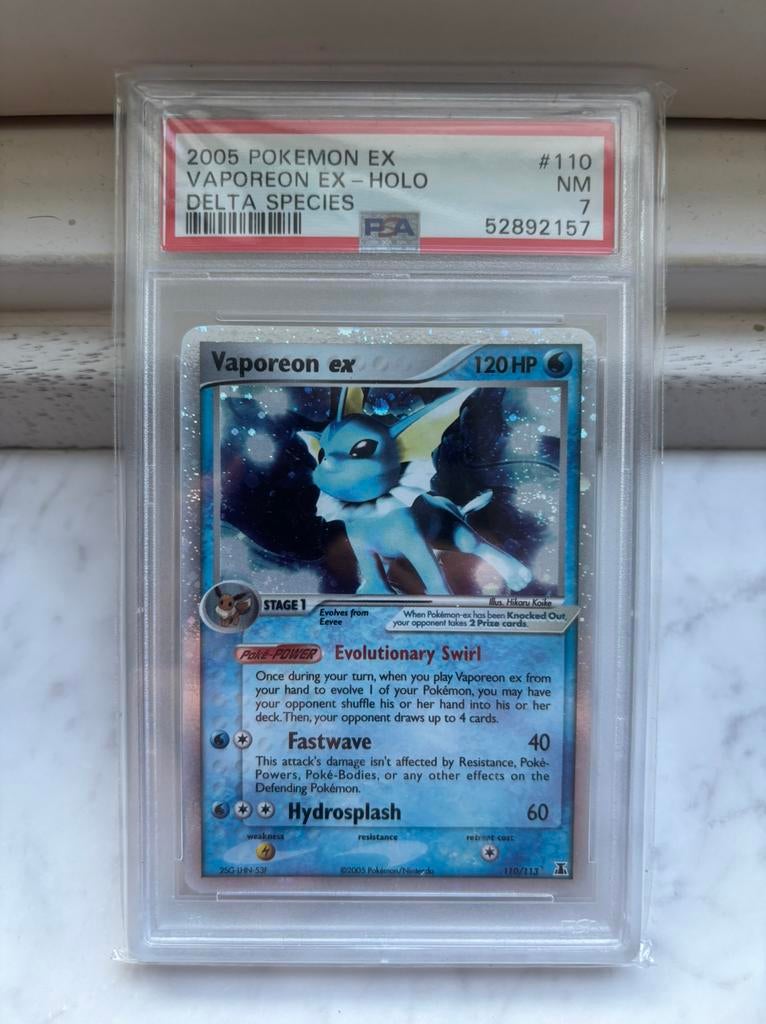 Vaporeon 110/113 Psa 7, Hobby en Vrije tijd, Verzamelkaartspellen | Pokémon, Ophalen of Verzenden, Zo goed als nieuw, Losse kaart