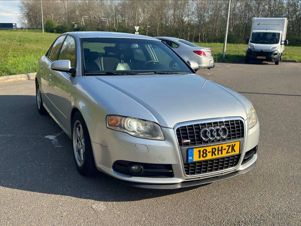 Audi A4 2.0 Tfsi 147KW AUT 2005 Grijs, Auto's, Audi, Zwart, 4 cilinders, 1984 cc, Origineel Nederlands