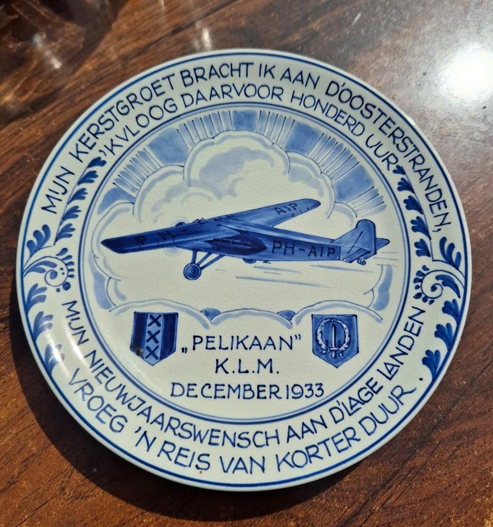 Porceleyne fles wandbord ongeveer 20 cm 1933, Ophalen