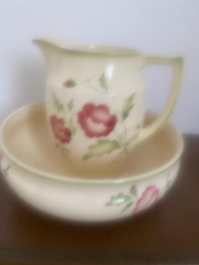 Antieke waterkan met opvang schaal, Ophalen