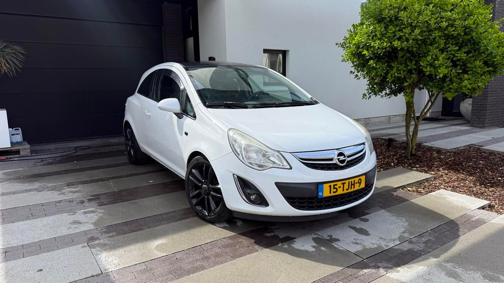 Opel Corsa 1.2 16V 3D 2012 Wit, Auto's, Opel, Corsa, Benzine, B, Hatchback, Handgeschakeld, Origineel Nederlands, Wit, Zwart, Stof