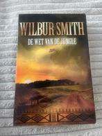 Wilbur Smith - De wet van de jungle (Courtney trilogie deel, Boeken, Ophalen of Verzenden, Zo goed als nieuw