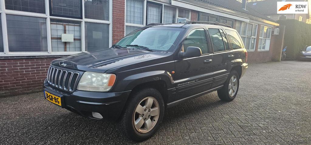 Jeep Grand Cherokee 4.7i V8 Limited, Auto's, Jeep, Automaat, Stoelverwarming, 1826 kg, Gebruikt