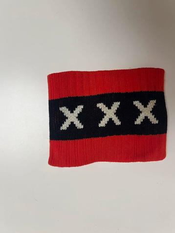 Ajax aanvoerdersband- Rood/Zwart/Wit beschikbaar voor biedingen