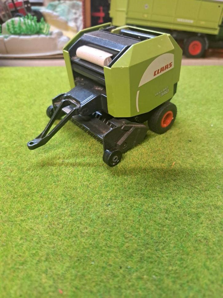 Claas Rollant 340 rondebalen pers van Siku met nr. 2268, Hobby en Vrije tijd, Modelauto's | 1:32, Zo goed als nieuw, Tractor of Landbouw