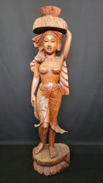 Balinese Houtsnijkunst, Ophalen