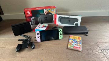Nintendo switch + reisetui en mario maker 2 beschikbaar voor biedingen