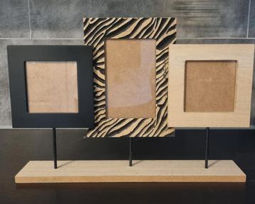 Leuke fotolijstjes op standaard.
Voor 3 foto's.
Dierenprint. beschikbaar voor biedingen