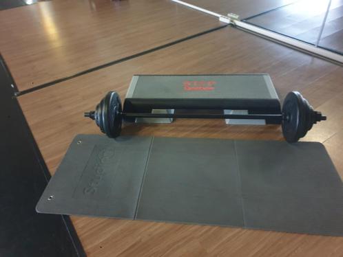 Les Mills Bodypump set + Reebok step bankje + Yoga Mat, Sport en Fitness, Fitnessmaterialen, Gebruikt, Halterset, Armen, Benen