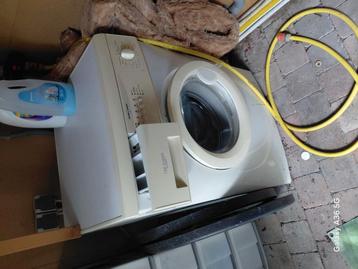 Wasmachine beschikbaar voor biedingen