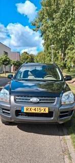 Kia Sportage 2.0 2WD met lage kilometerstand, Auto's, Kia, 74 €/maand, Zwart, 19 km/l, Particulier