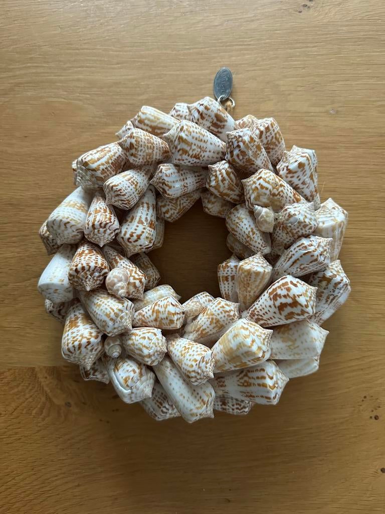 Schelpenkrans, Ophalen, Zo goed als nieuw