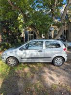 Hyundai Getz 1.1 3DRS 2005 Grijs, Auto's, Voorwielaandrijving, 450 kg, 4 cilinders, Origineel Nederlands