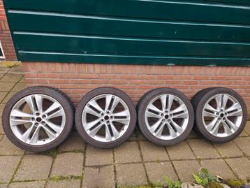 Originele Opel Astra J lichtmetalen velgen met winterbanden  beschikbaar voor biedingen