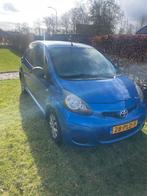 Toyota Aygo 1.0 12V Vvt-i 5DRS 2011 Blauw, Auto's, Toyota, Voorwielaandrijving, Stof, Zwart, 68 pk