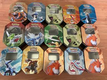 Diverse Pokemon kaarten blikken (zonder kaarten) beschikbaar voor biedingen