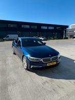 BMW 5-Serie 520i 184pk Aut. 2017 Blauw, Auto's, 1998 cc, Achterwielaandrijving, 4 cilinders, 2000 kg