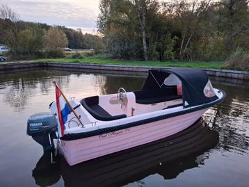 Oud huijzer 500 roze met yamaha 9.9pk 4 takt beschikbaar voor biedingen