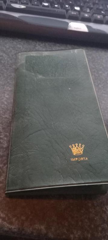 mapje met oude munten  beschikbaar voor biedingen