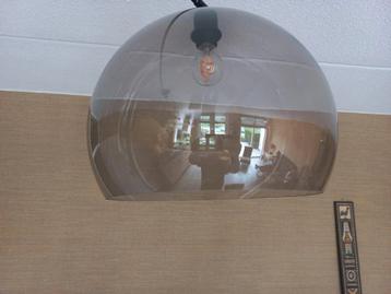 Vaste donker  getinte hanglamp.
